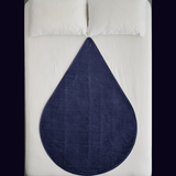 navy blue waterproof sex mat displayed on bed