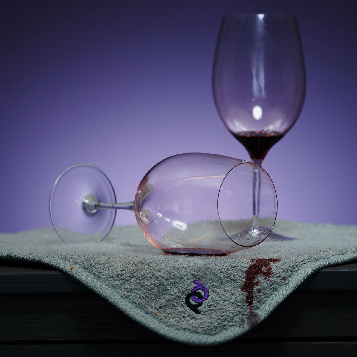wine glass spilling on playdrop mat